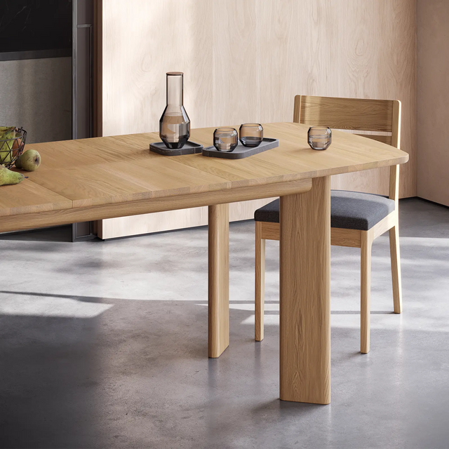 Solid wood extending dining table made from white oak.